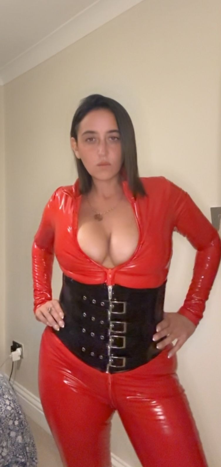 Scarlett — red latex open zip black corset standing